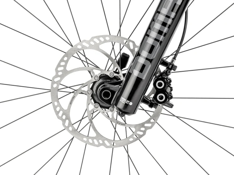 Moustache Clutch 160.8 close-up of front Magura brake and RockShox fork