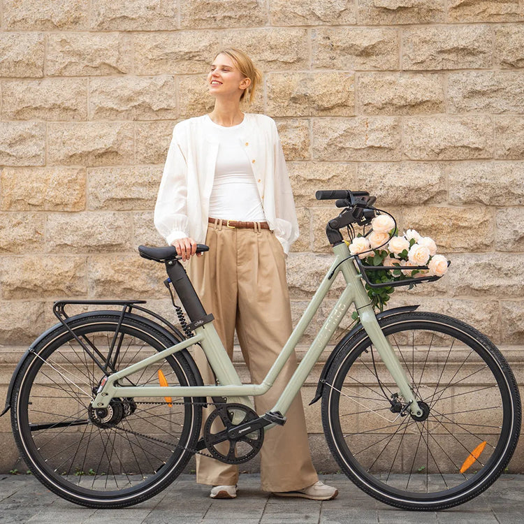 Fiido C700 green electric bike with rider, optional front basket and rear rack