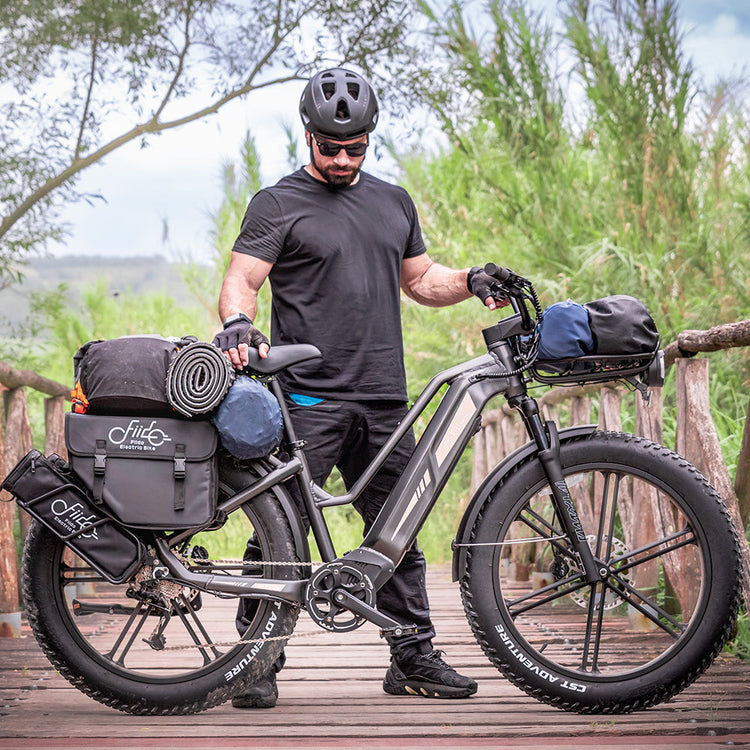 Fiido Titan electric bike loaded with optional adventure luggage